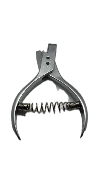 Дырокол универсальный1